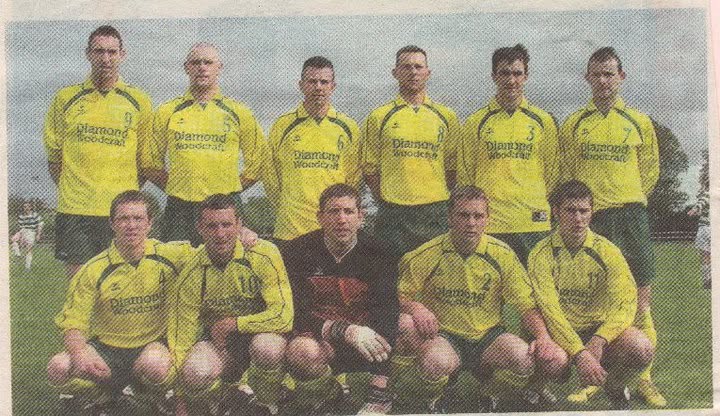 Crettyard United squad photo in Diamond Woodcraft kit