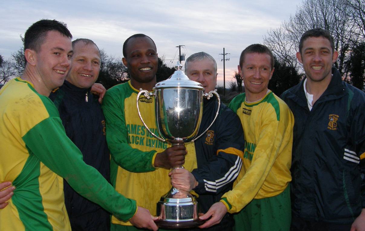 Crettyard United Premier League champions 2010 with the cup in James Dunne Block Laying kit