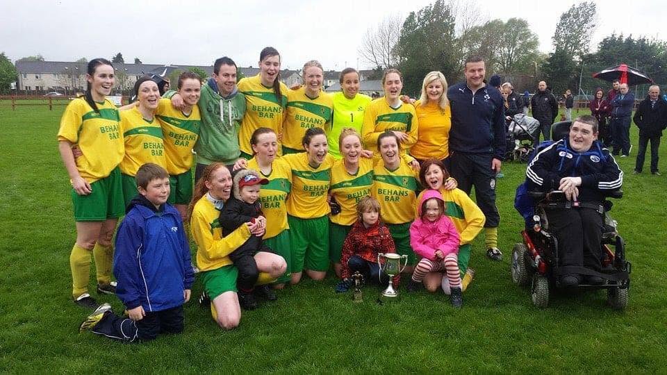 Crettyard United ladies team, families and supporters celebrating with the cup