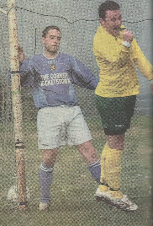 Crettyard United player beside the goalpost during a match