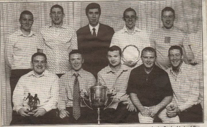 Crettyard United players and officials with trophies at a club presentation night