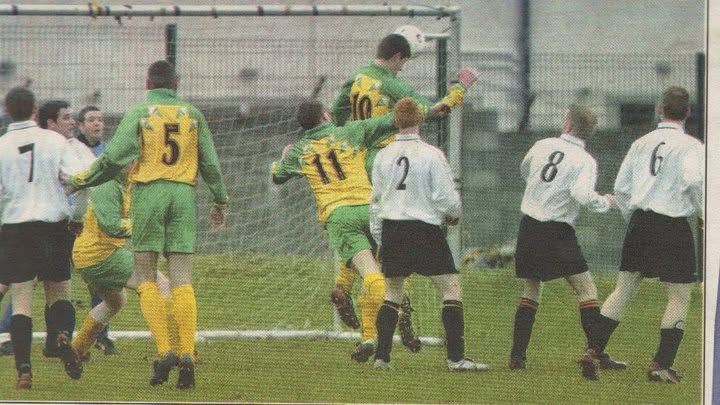 Crettyard United players attacking a corner at the back post
